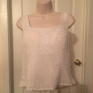 Beaded sleeveless top.